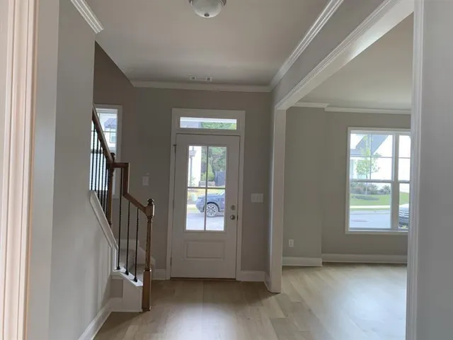 wooden floor and windows in an empty room