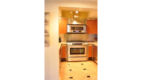 a kitchen with a stove and a microwave
