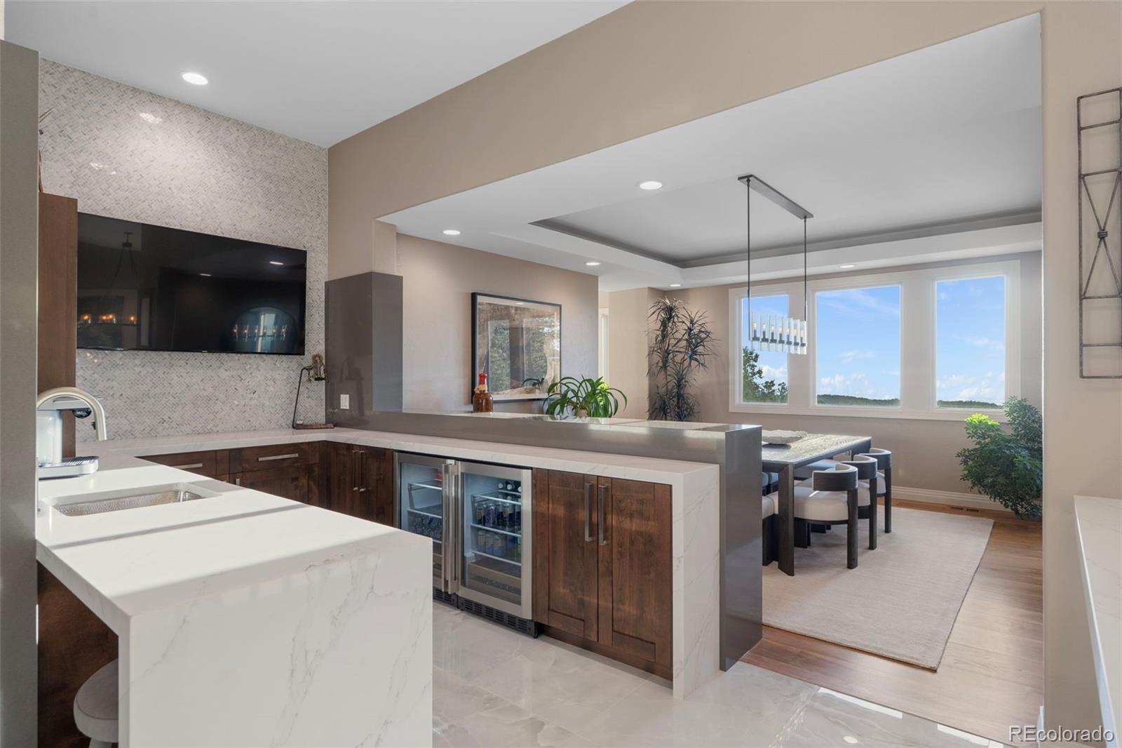 730 Genesee Mountain Road Golden, CO 80401 - Photo 9 of 50 a kitchen with a sink a counter space appliances and cabinets