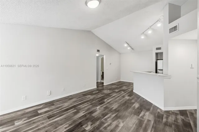 front view of a building with a yard