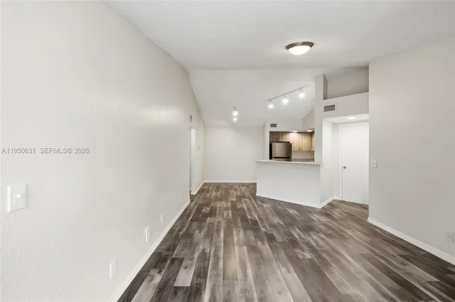 a view of a building with a street