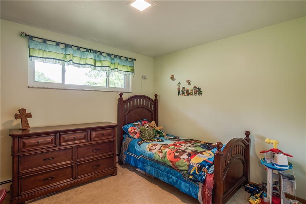 249 Barbara Drive McKees Rocks, PA 15136 - Photo 12 of 20 The second bedroom has a double closet, wall to wall carpeting and a large window.