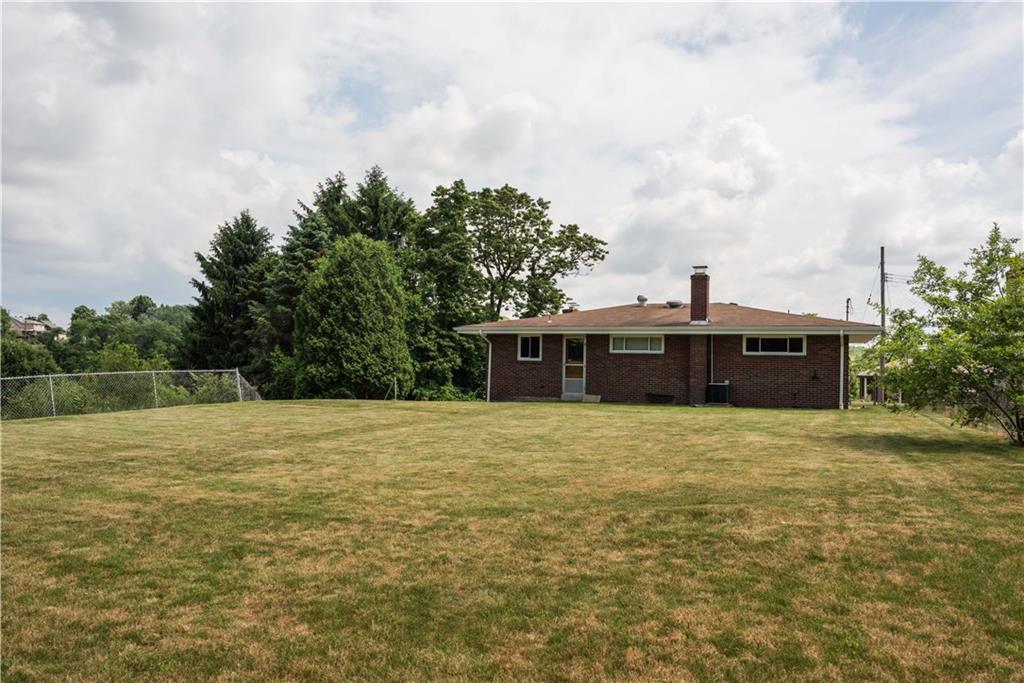 249 Barbara Drive McKees Rocks, PA 15136 - Photo 19 of 20 A view from the yard and the rear facade.