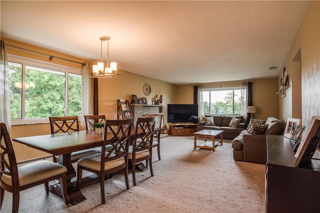 249 Barbara Drive McKees Rocks, PA 15136 - Photo 4 of 20 The wide open living room and dining room is light and bright with large newer picture windows!
