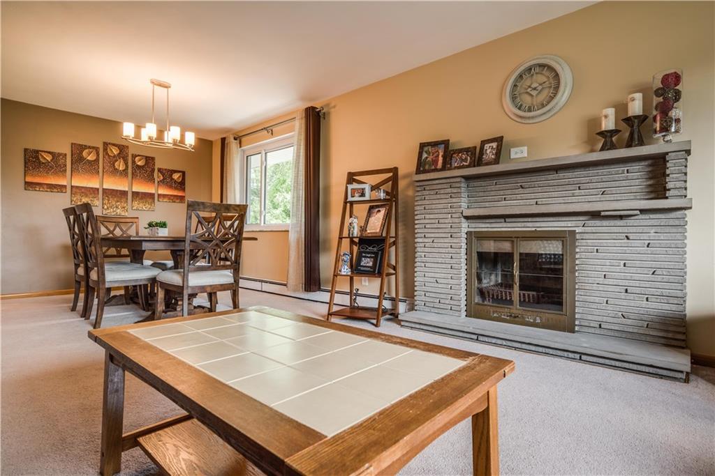249 Barbara Drive McKees Rocks, PA 15136 - Photo 6 of 20 A beautiful cut stone stone fireplace frames the living room and will warm you on those cold winter nights. A nice open floor plan!