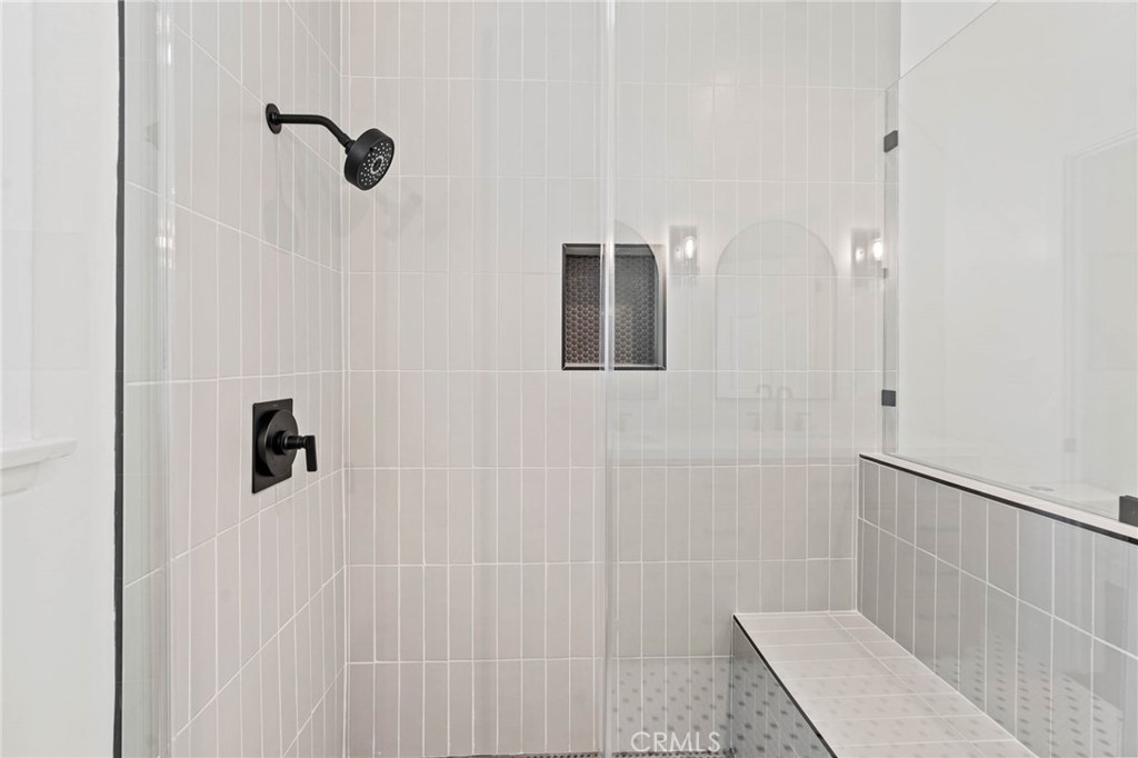 23642 Community Street West Hills, CA 91304 - Photo 19 of 38 a bathroom with a shower