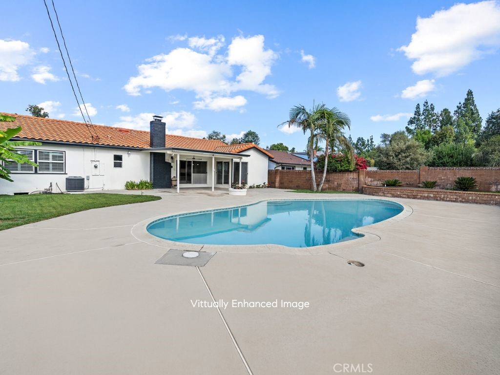 23642 Community Street West Hills, CA 91304 - Photo 34 of 38 a view of a house with swimming pool