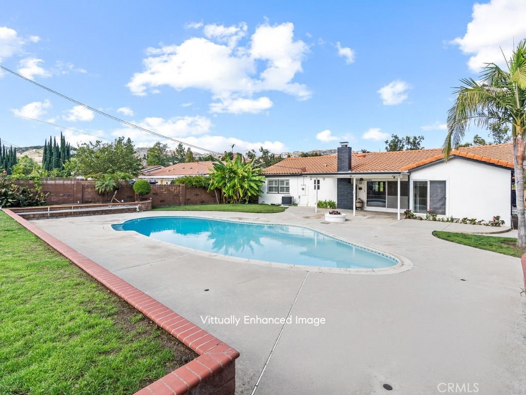 23642 Community Street West Hills, CA 91304 - Photo 36 of 38 a view of a house with a big yard and potted plants