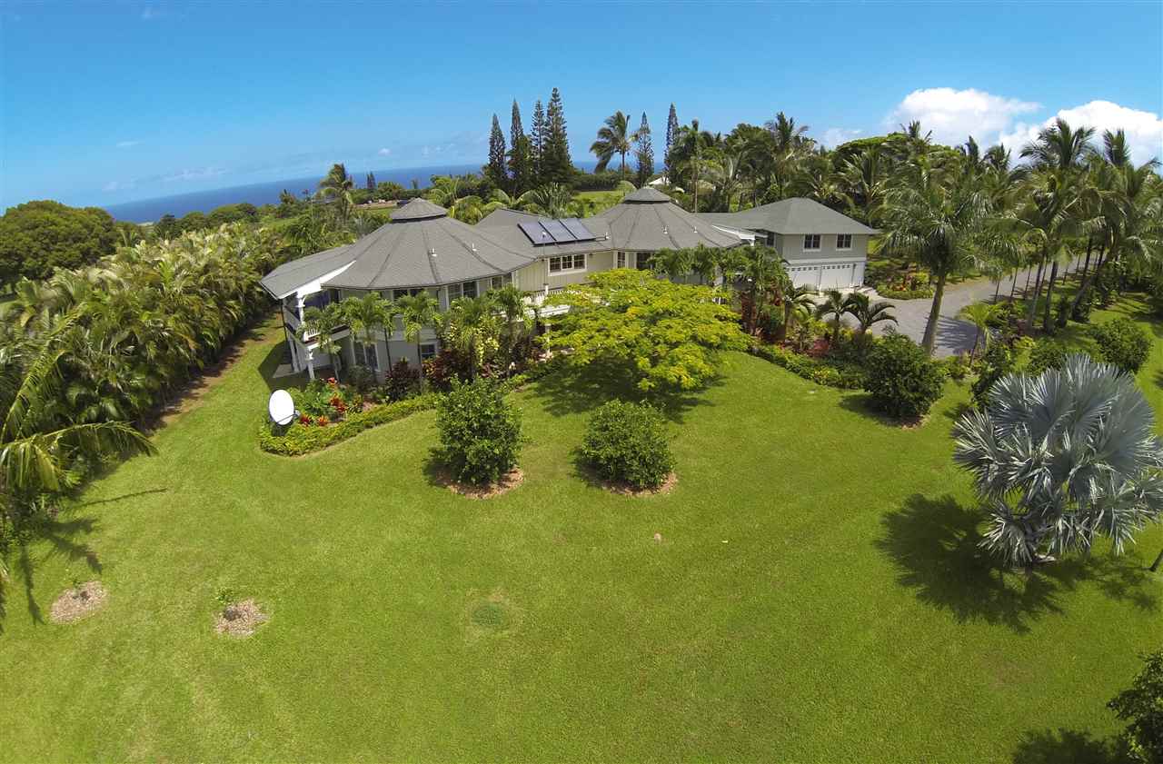 a view of a houses with a lake view