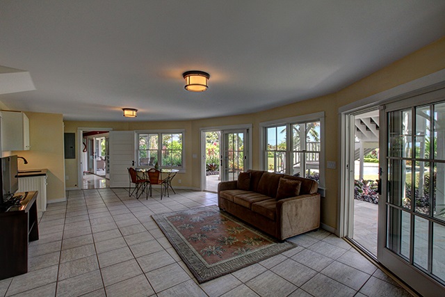 65 North Holokai Road Haiku, HI 96708 - Photo 11 of 23 a living room with furniture and a floor to ceiling window