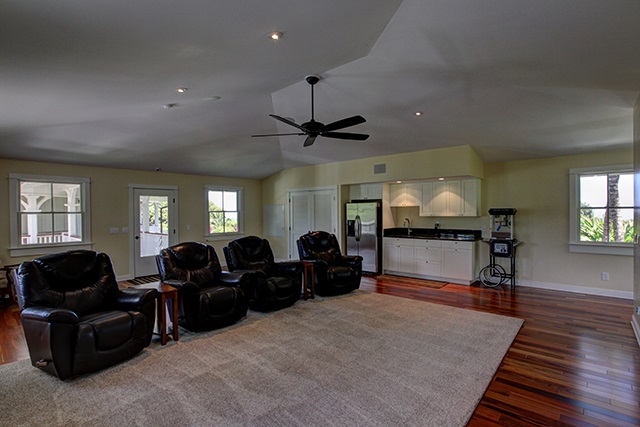 65 North Holokai Road Haiku, HI 96708 - Photo 14 of 23 a living room with furniture and a flat screen tv
