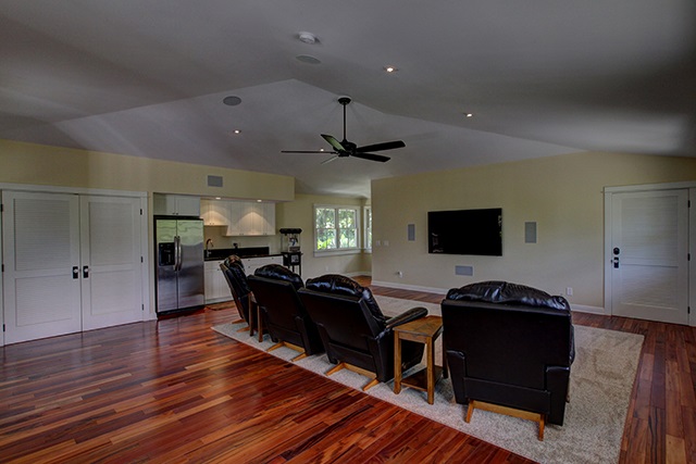 65 North Holokai Road Haiku, HI 96708 - Photo 15 of 23 a living room with furniture and a flat screen tv
