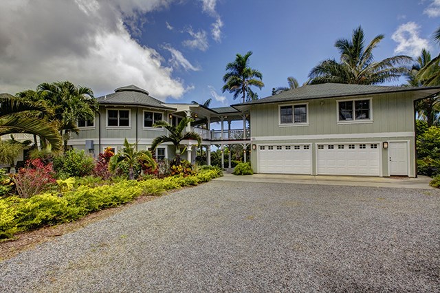 65 North Holokai Road Haiku, HI 96708 - Photo 20 of 23 front view of a house with a yard