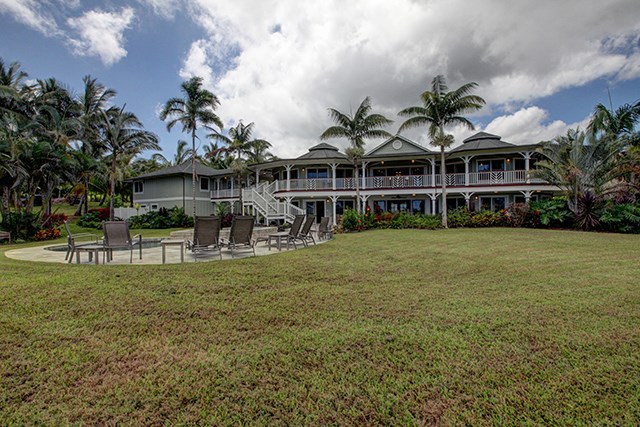 65 North Holokai Road Haiku, HI 96708 - Photo 23 of 23 a view of a house with a big yard and potted plants