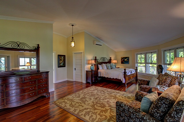 65 North Holokai Road Haiku, HI 96708 - Photo 4 of 23 a bedroom with a bed window and a couch
