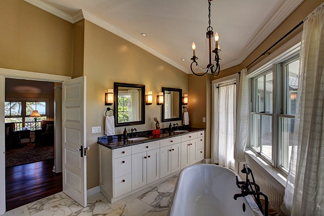 65 North Holokai Road Haiku, HI 96708 - Photo 5 of 23 a spacious bathroom with a double vanity sink a mirror a window and a shower