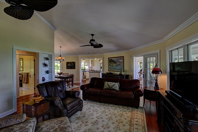 65 North Holokai Road Haiku, HI 96708 - Photo 8 of 23 a living room with furniture and a flat screen tv
