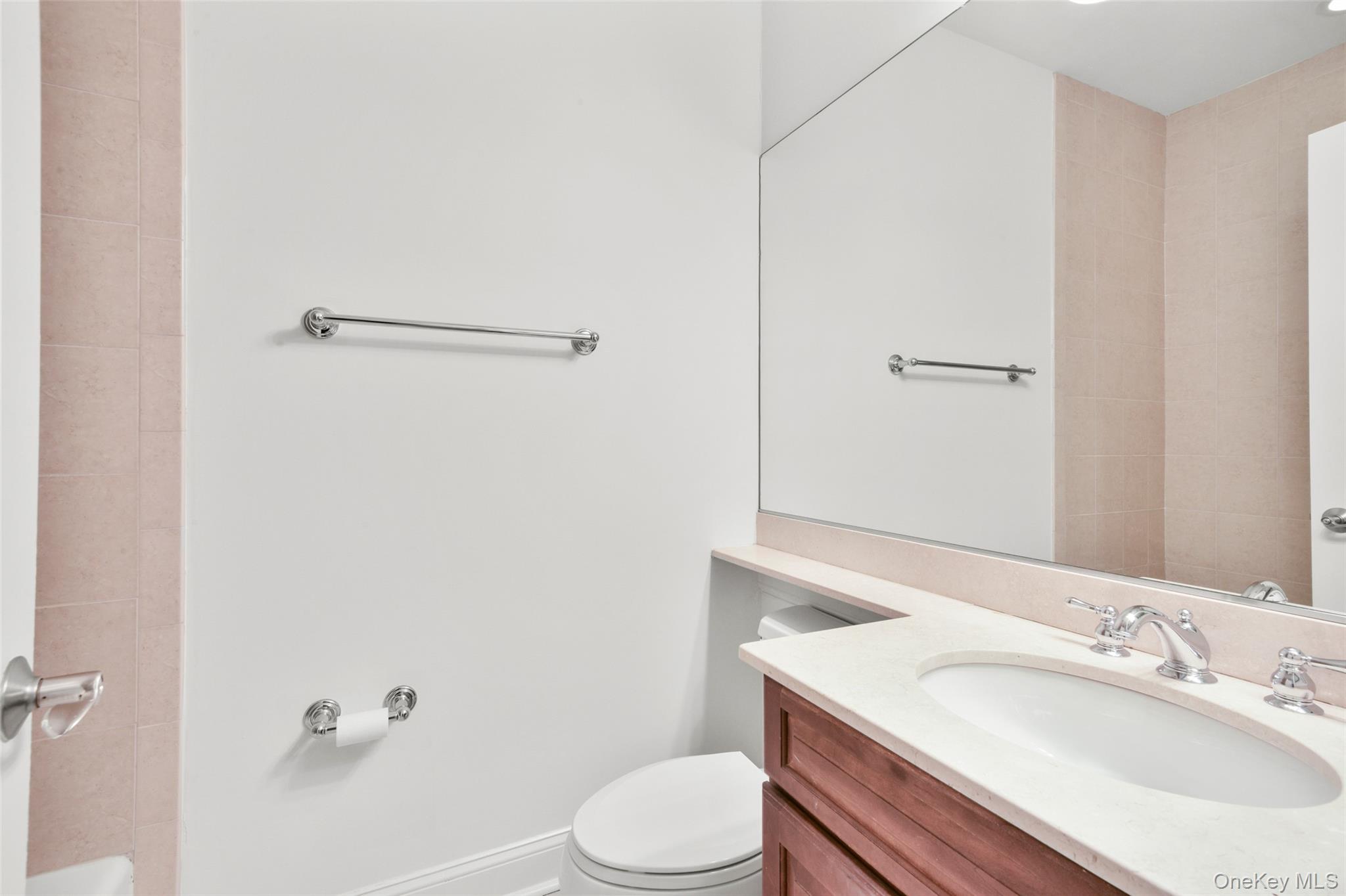 55 1st Street, Unit 207 Pelham, NY 10803 - Photo 9 of 23 Full bath with vanity and toilet