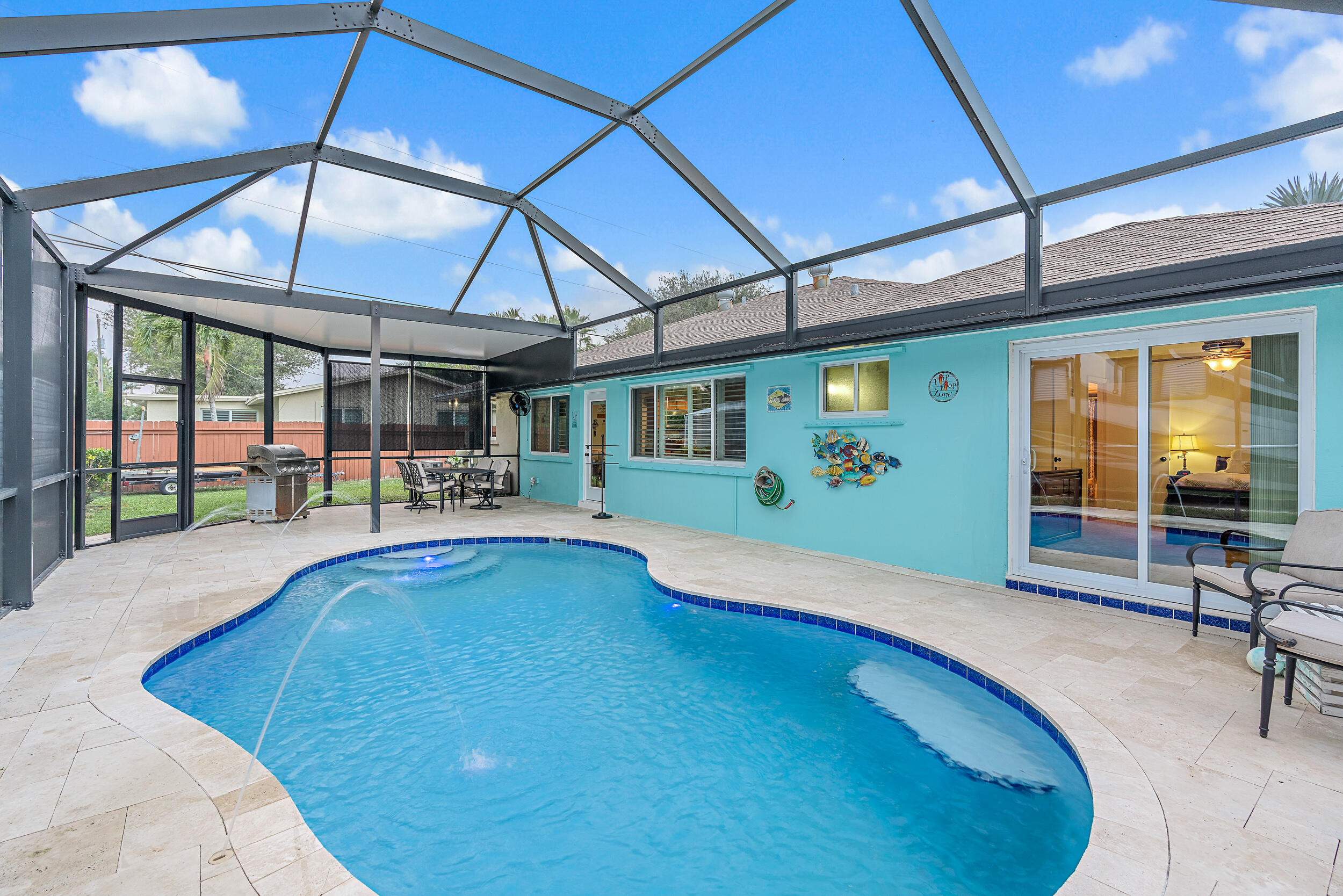 100 Windsor Road West Jupiter, FL 33469 - Photo 10 of 11 a view of a swimming pool with a patio