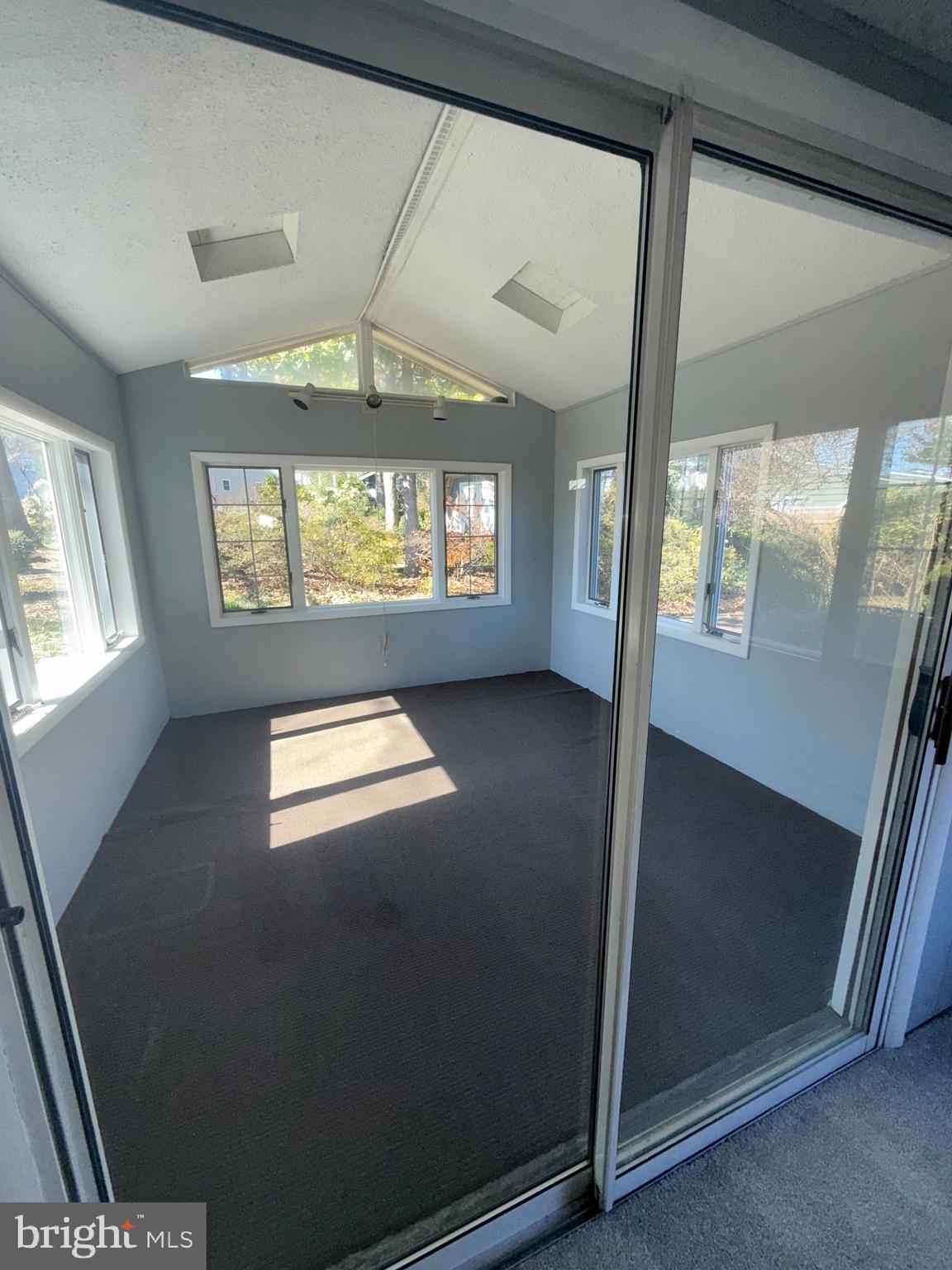 2 Stevens Road Glen Burnie, MD 21060 - Photo 12 of 27 wooden floor in an empty room with a window