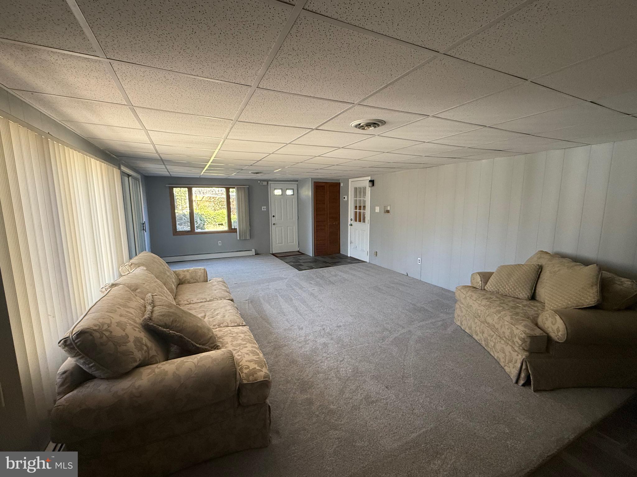 2 Stevens Road Glen Burnie, MD 21060 - Photo 17 of 27 a living room with furniture and a window