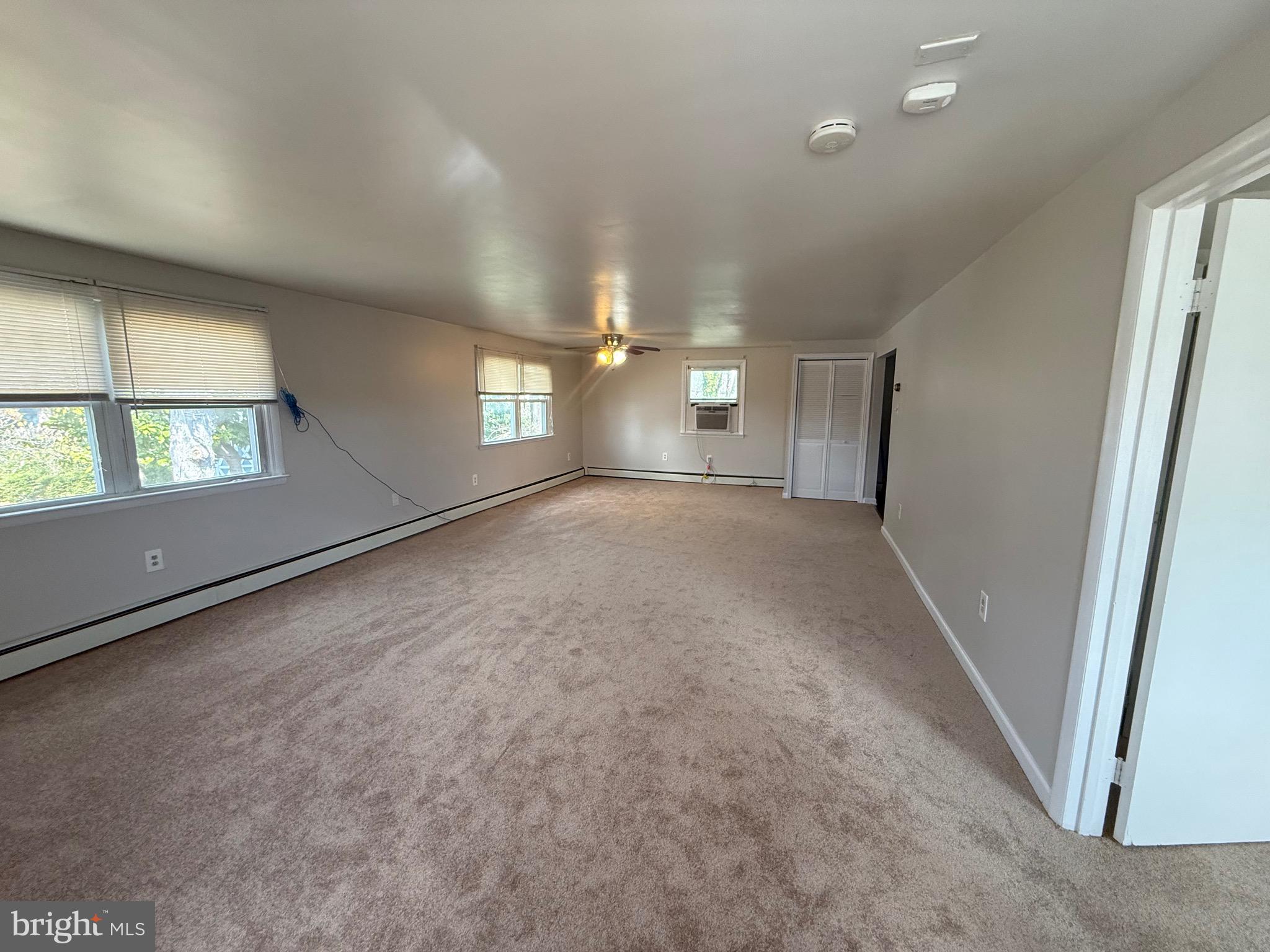 2 Stevens Road Glen Burnie, MD 21060 - Photo 18 of 27 an empty room with windows and entrance