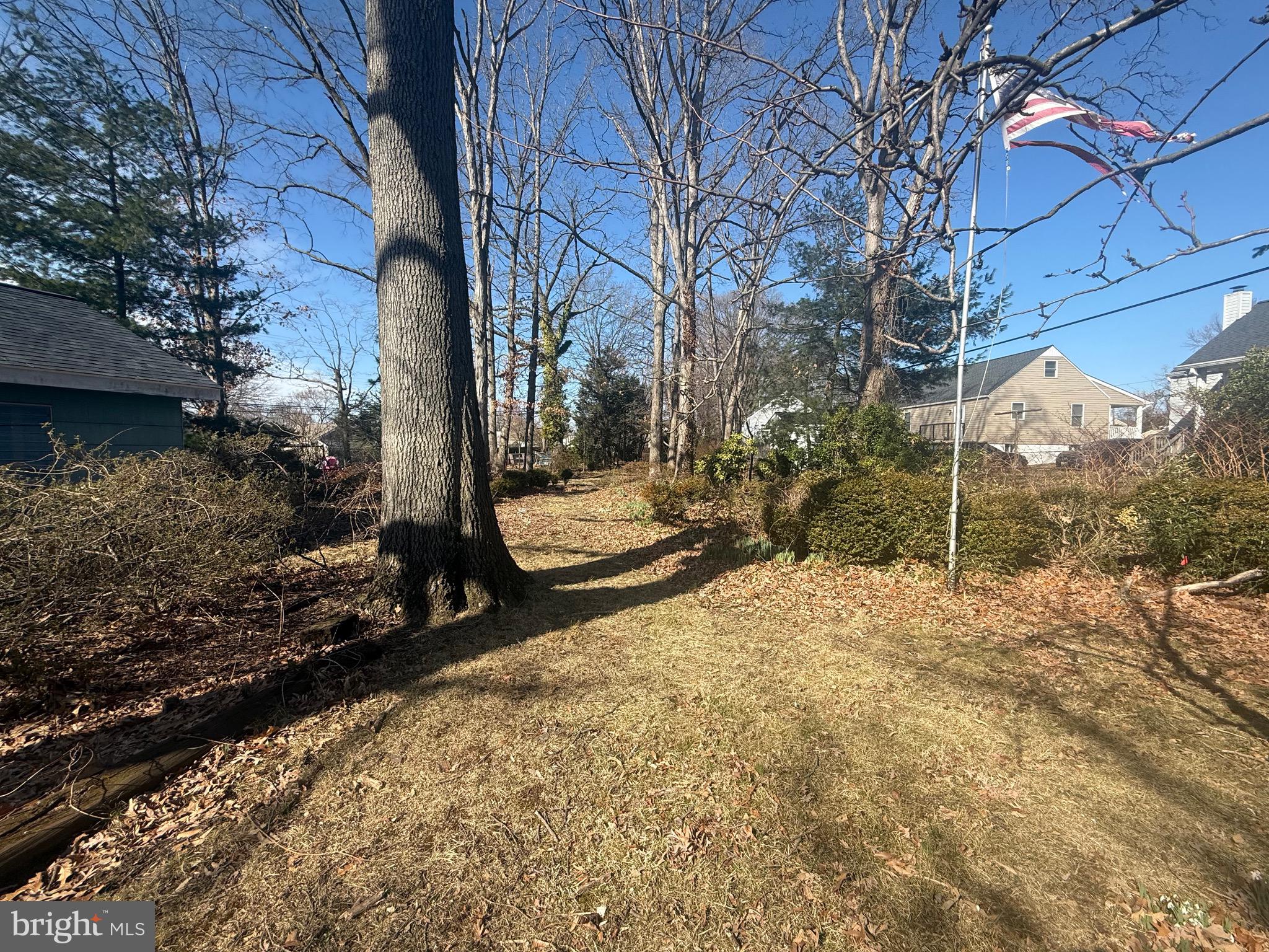2 Stevens Road Glen Burnie, MD 21060 - Photo 5 of 27 a view of a yard with wooden fence