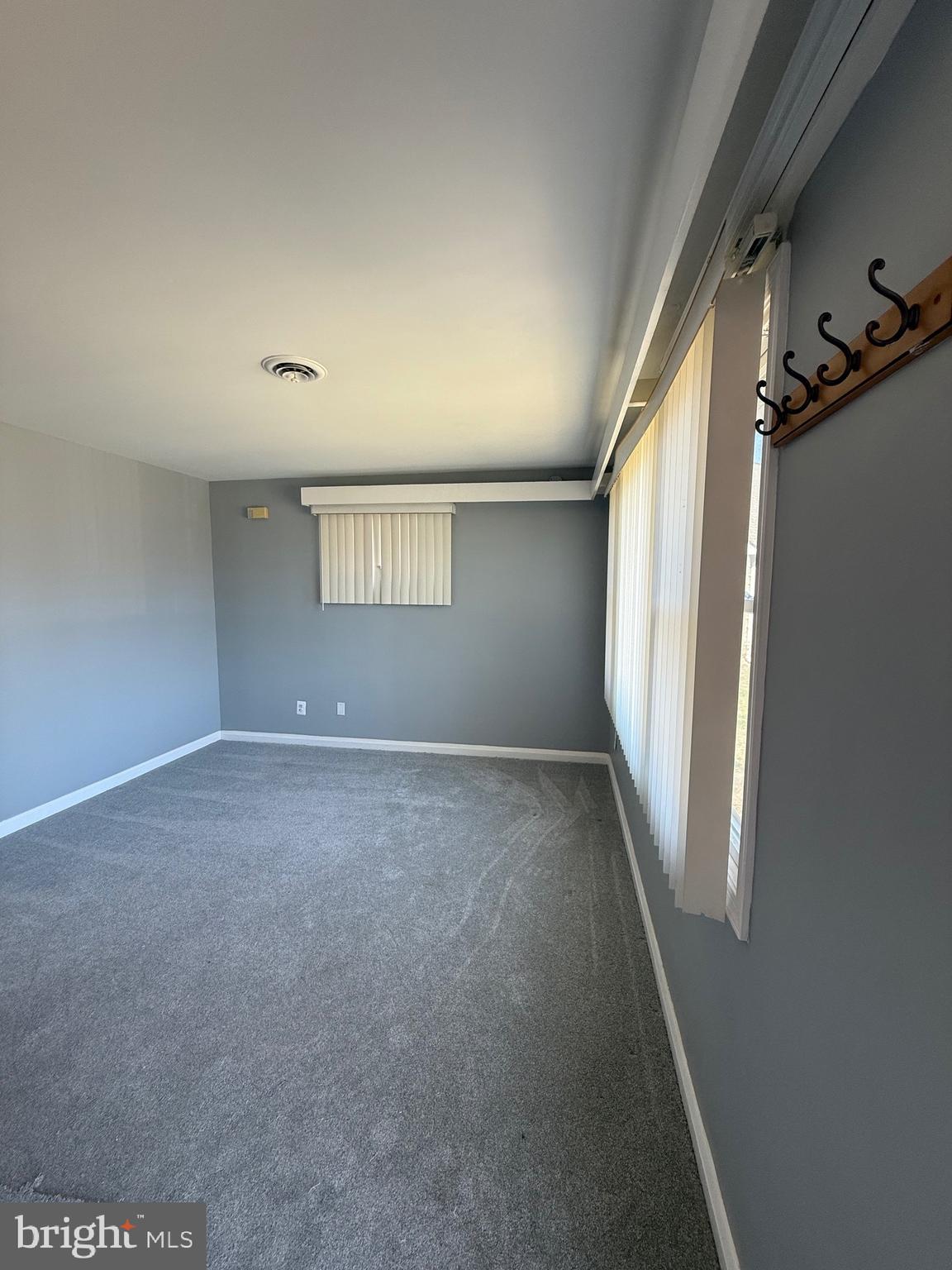 2 Stevens Road Glen Burnie, MD 21060 - Photo 6 of 27 an empty room with windows
