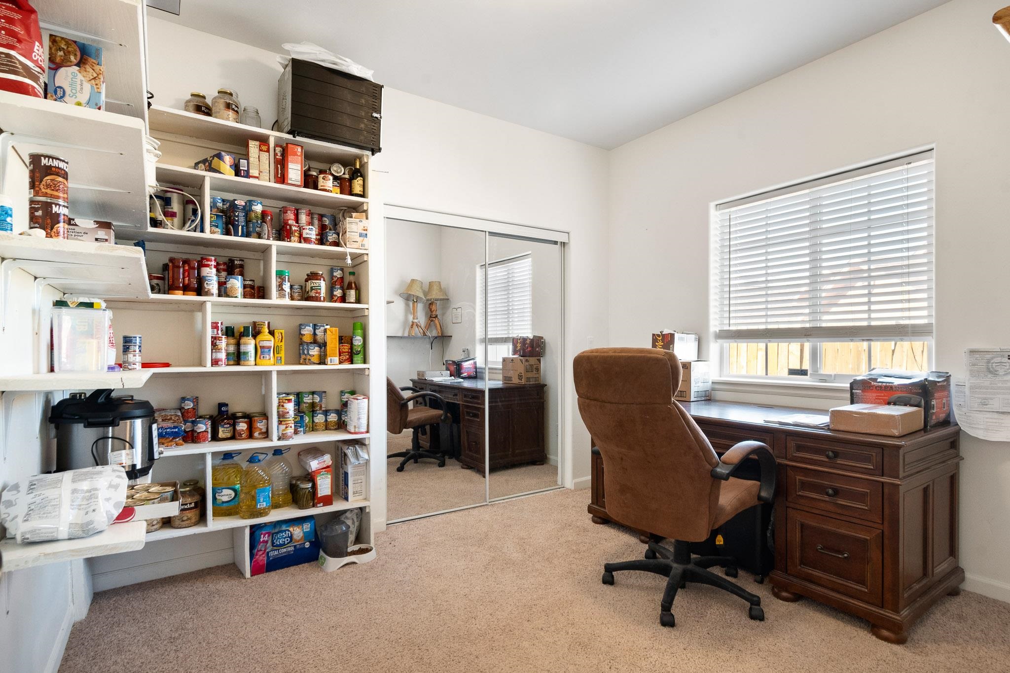42 Eagle Court Parachute, CO 81635 - Photo 11 of 30 a view of a workspace with furniture and a window
