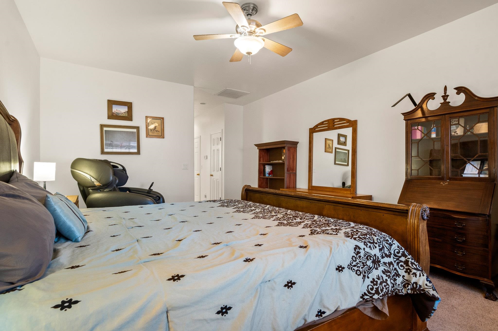 42 Eagle Court Parachute, CO 81635 - Photo 14 of 30 a bedroom with a bed and wooden floor