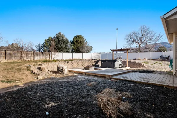 a view of a yard with an outdoor space