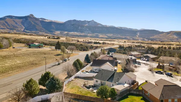 a view of a city with mountains in the background