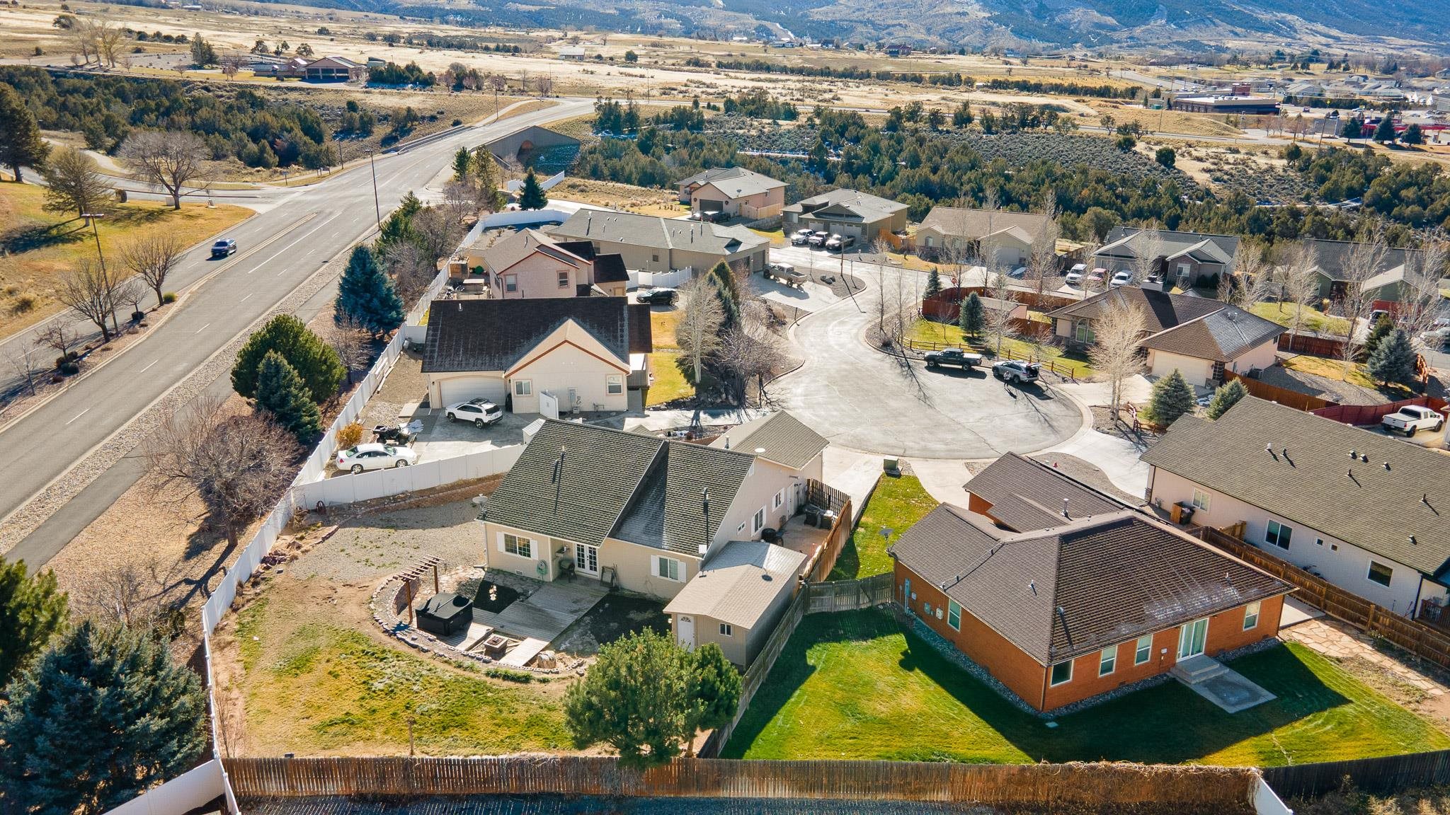 42 Eagle Court Parachute, CO 81635 - Photo 28 of 30 an aerial view of a house with a yard and lake view