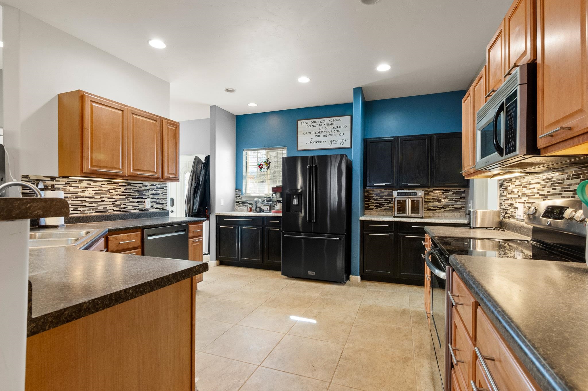 42 Eagle Court Parachute, CO 81635 - Photo 5 of 30 a kitchen with a refrigerator sink and stove