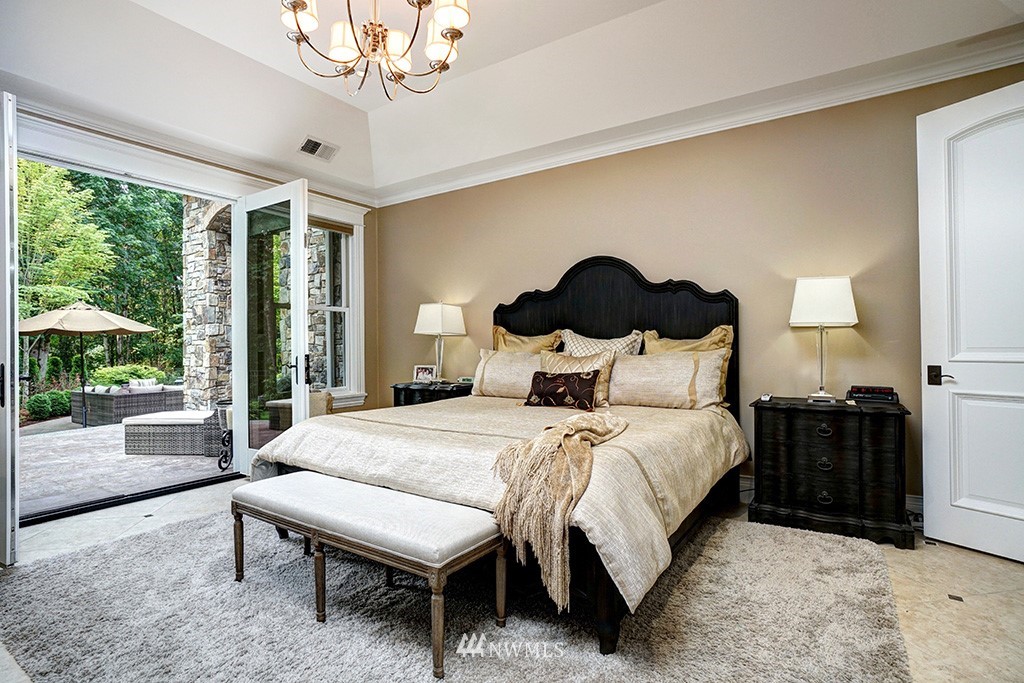 25205 Northeast 39th Way Redmond, WA 98053 - Photo 12 of 25 a spacious bedroom with a bed and a large window