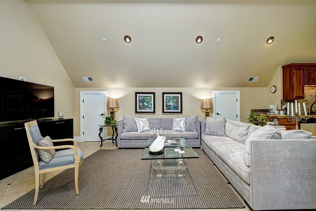 25205 Northeast 39th Way Redmond, WA 98053 - Photo 15 of 25 a living room with furniture and a flat screen tv
