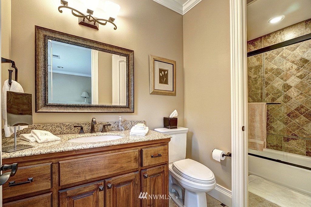 25205 Northeast 39th Way Redmond, WA 98053 - Photo 18 of 25 a bathroom with a toilet sink and mirror