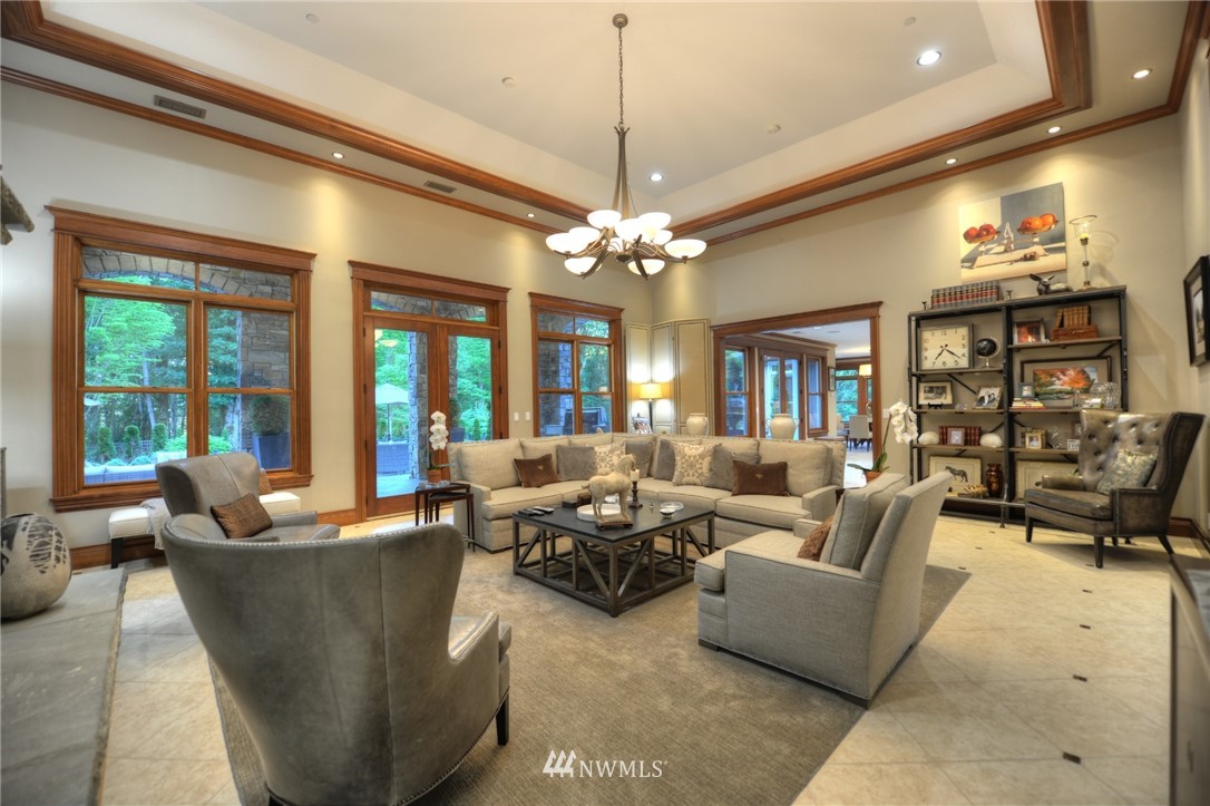 25205 Northeast 39th Way Redmond, WA 98053 - Photo 5 of 25 a living room with furniture and a chandelier