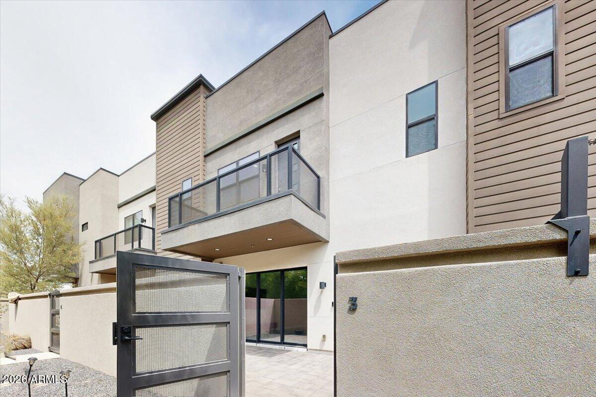 2645 East Osborn Road, Unit 3 Phoenix, AZ 85016 - Photo 1 of 14 a view of a house with a street