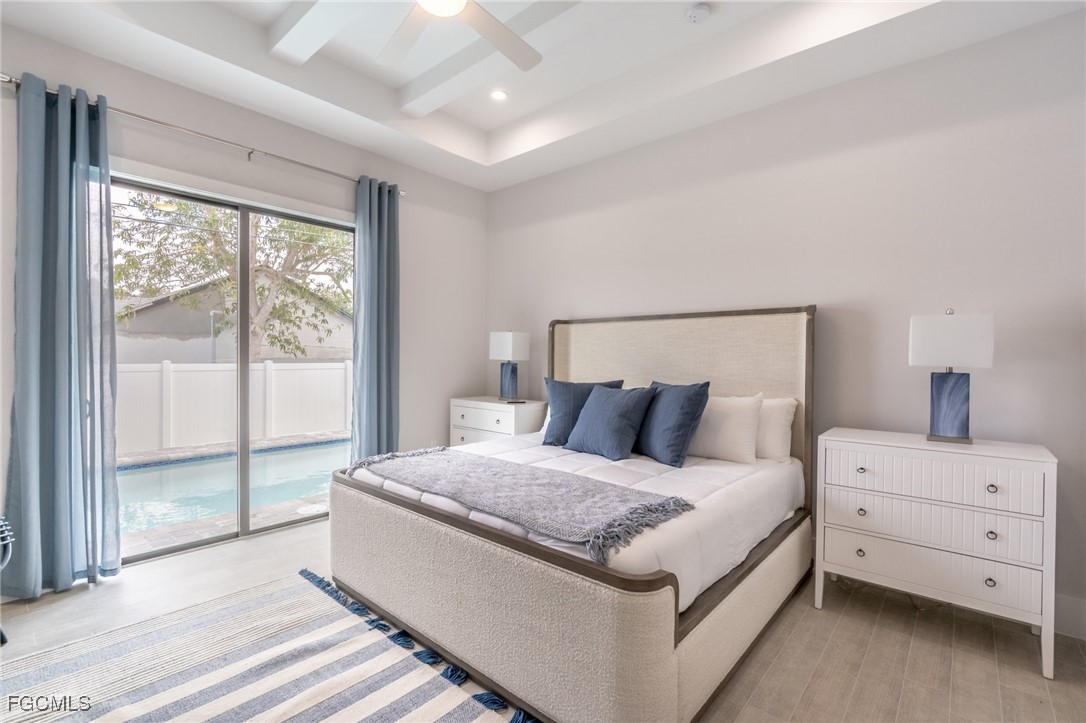 795 108th Avenue North Naples, FL 34108 - Photo 17 of 50 a view of bedroom and natural light