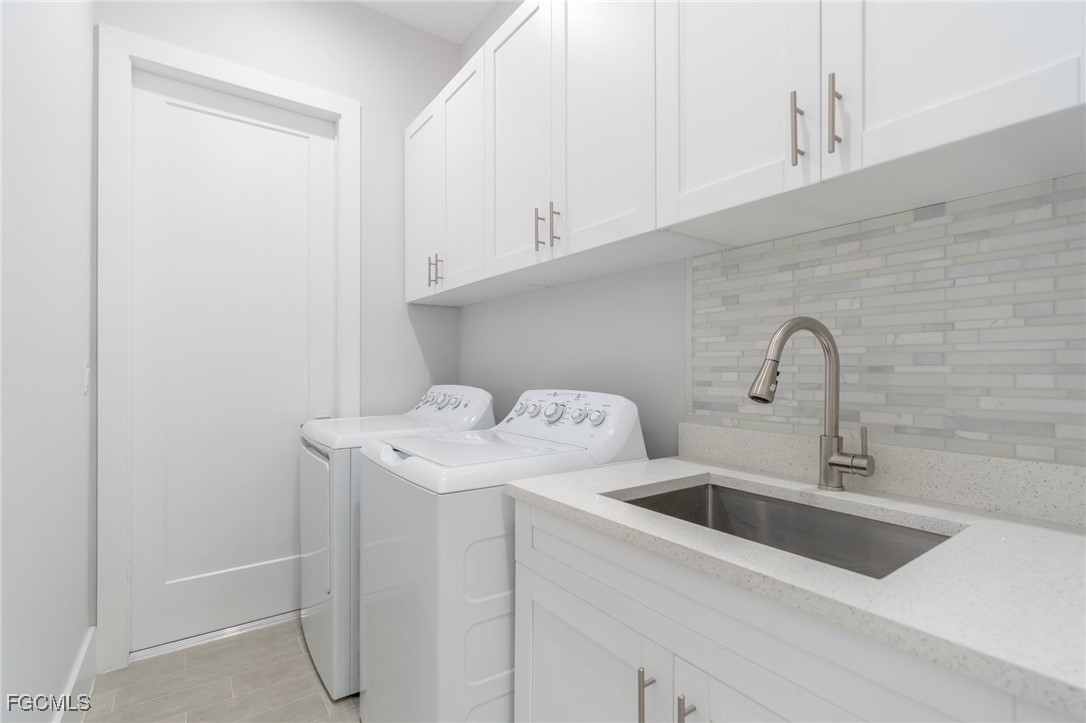 795 108th Avenue North Naples, FL 34108 - Photo 38 of 50 a close view of sink and tap