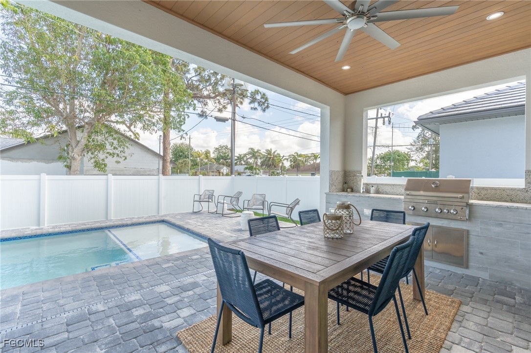 795 108th Avenue North Naples, FL 34108 - Photo 41 of 50 a dining room with furniture window and wooden floor