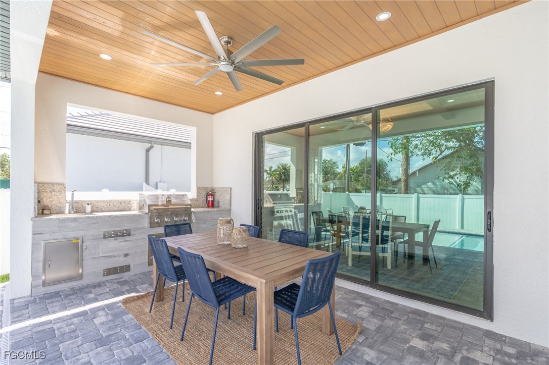 795 108th Avenue North Naples, FL 34108 - Photo 42 of 50 a view of a dining room with furniture window and outside view