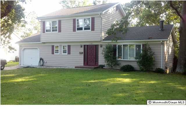 1761 Forge Pond Road Brick, NJ 08724 - Photo 1 of 12 a black and white photo of a house