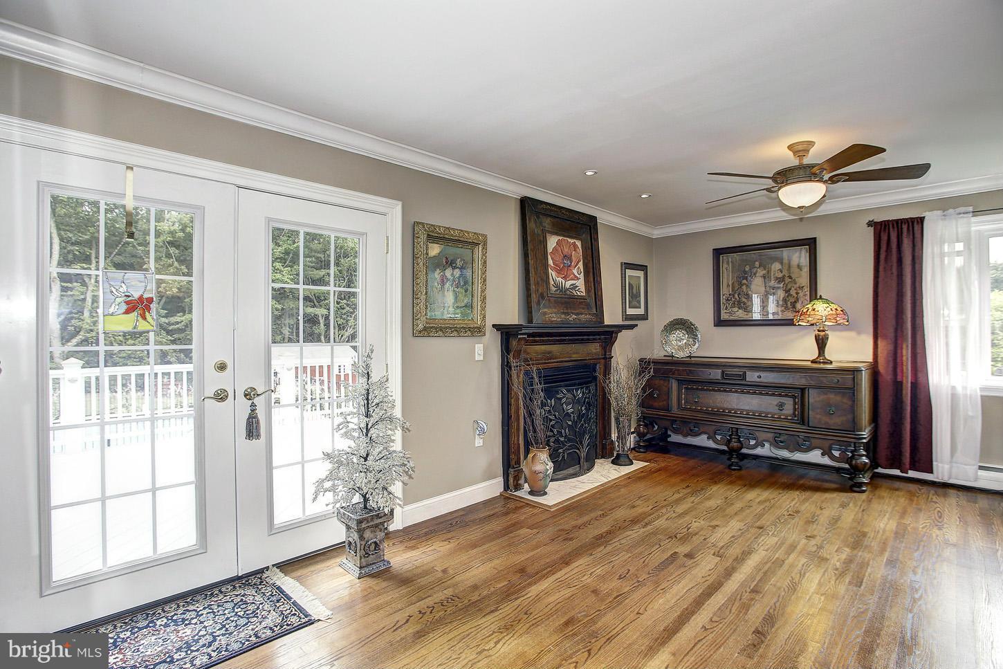3701 Altondale Road Reisterstown, MD 21136 - Photo 11 of 29 a bedroom with furniture and a fireplace
