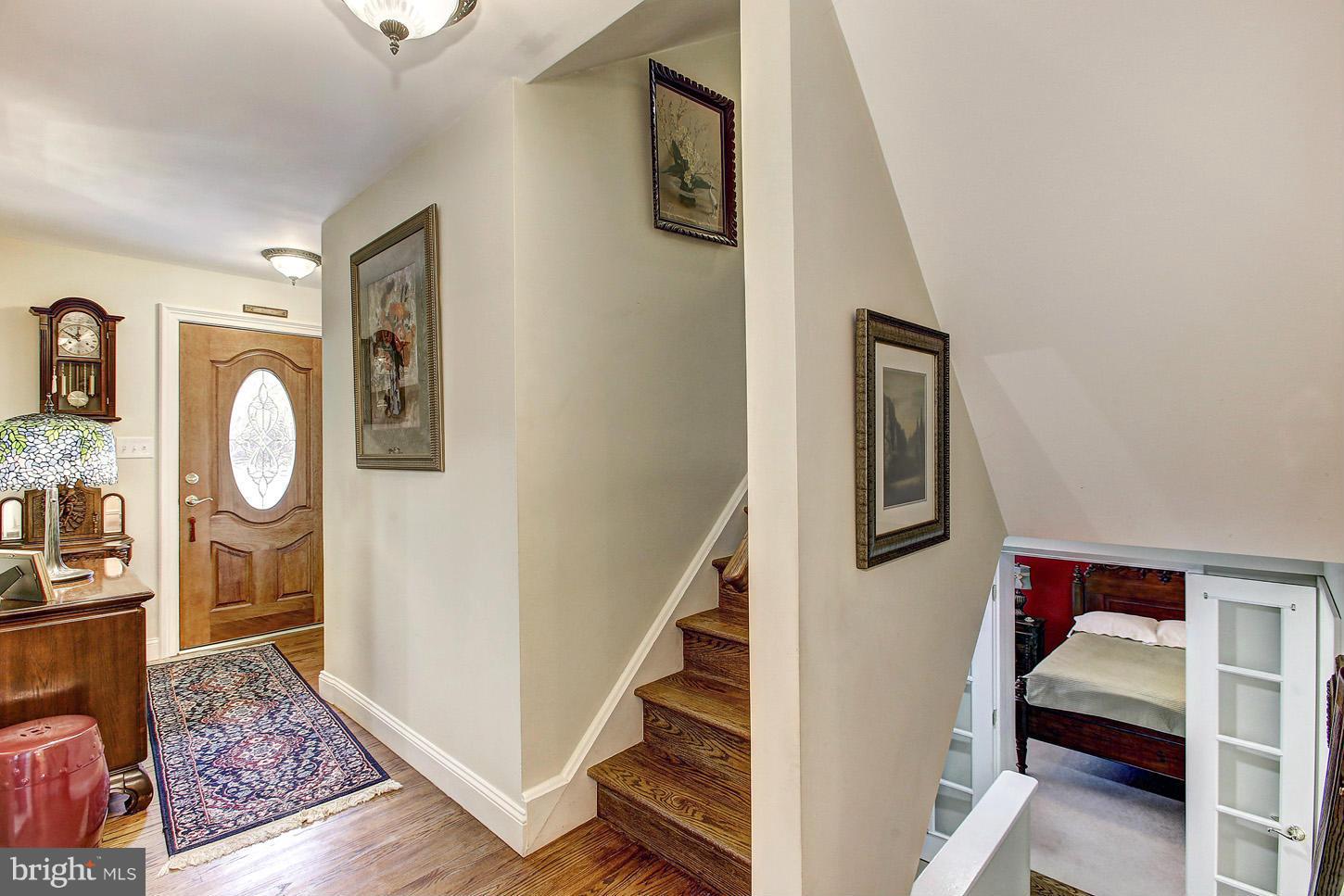 3701 Altondale Road Reisterstown, MD 21136 - Photo 14 of 29 a view of a hallway with wooden floor and entryway