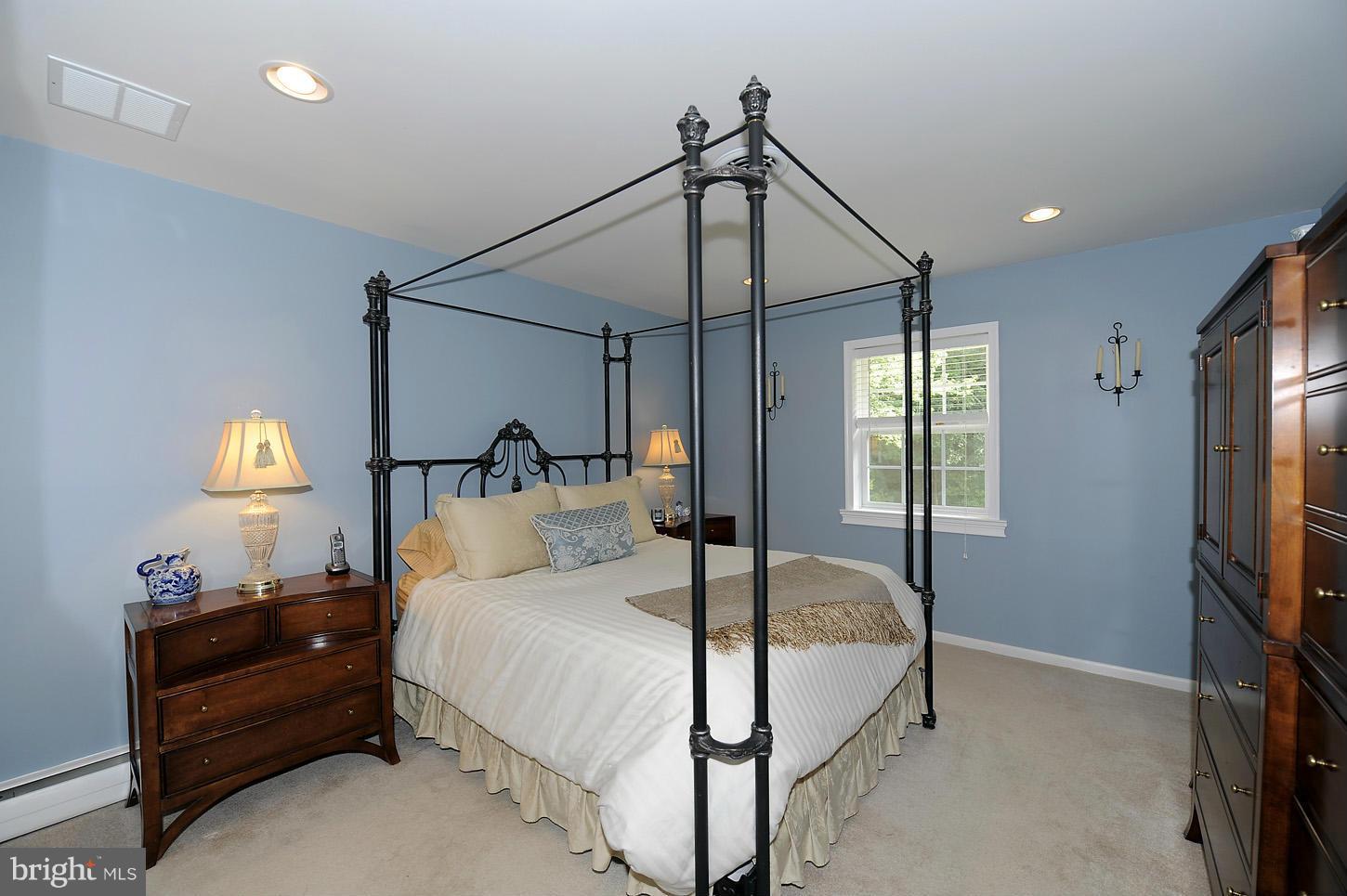 3701 Altondale Road Reisterstown, MD 21136 - Photo 17 of 29 a bedroom with a bed and a mirror