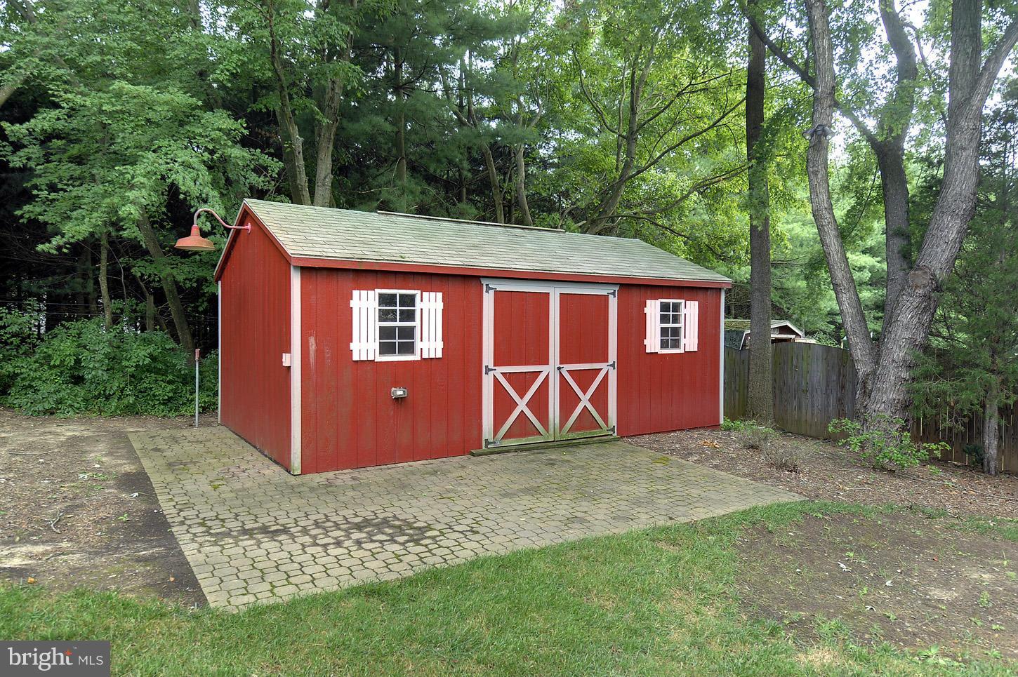 3701 Altondale Road Reisterstown, MD 21136 - Photo 24 of 29 a view of a barn with big yard and large trees
