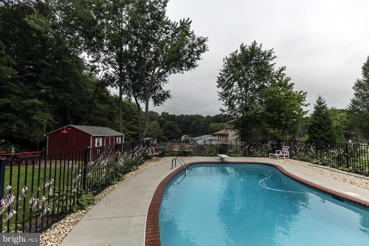3701 Altondale Road Reisterstown, MD 21136 - Photo 29 of 29 a view of a swimming pool with a garden