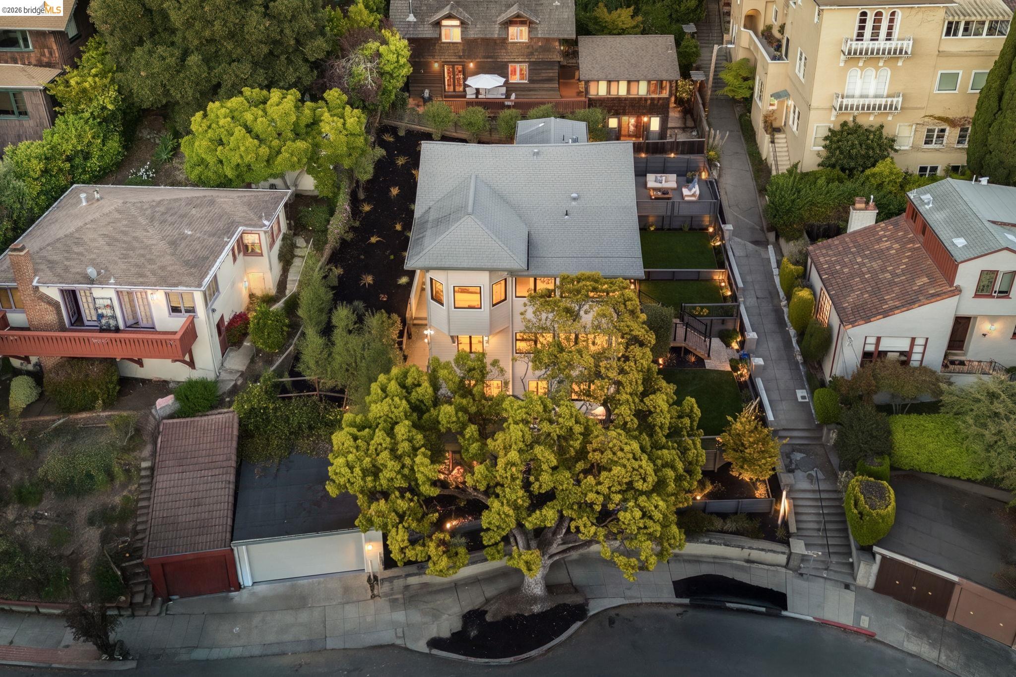 1409 Scenic Avenue Berkeley, CA 94708 - Photo 2 of 28 Hillside property featuring a multi-level structure with a gabled roof